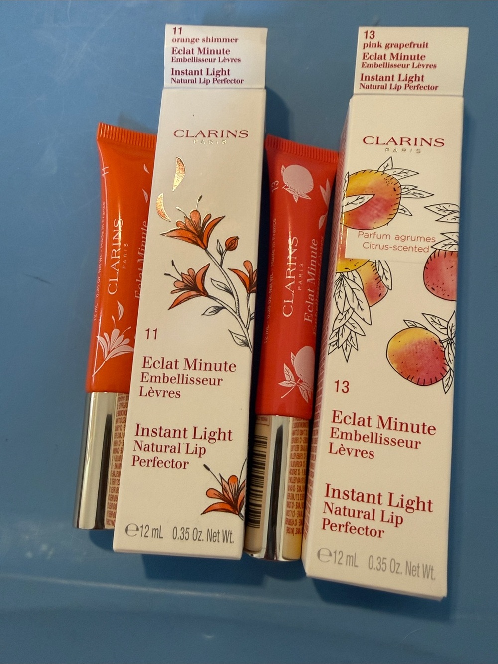 Clarins Instant Light Natural Lip Perfector — Orange Shimmer & Pink Grapefruit